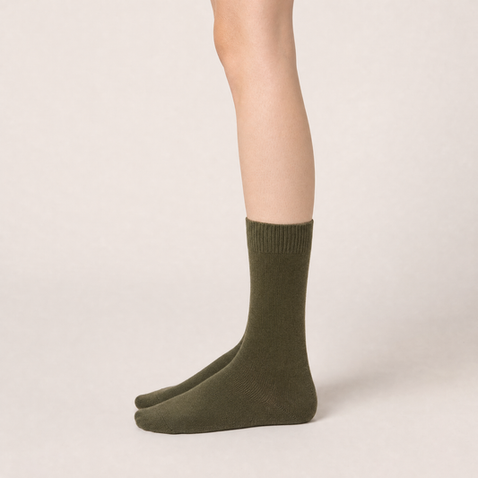 Olive merino crew socks worn, side view