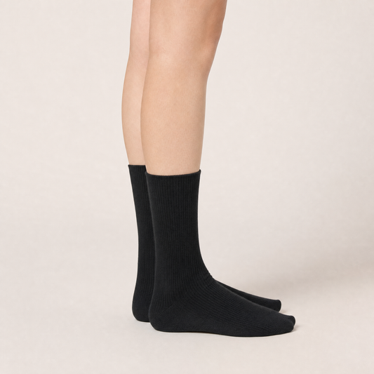 Black ribbed trouser socks worn, side view