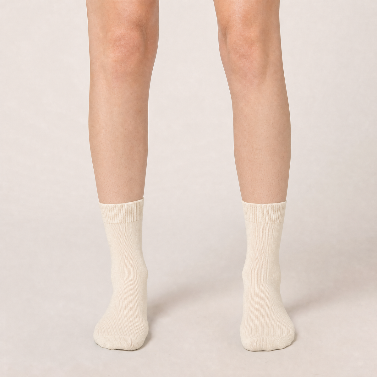 Ivory dress crew socks worn, front view