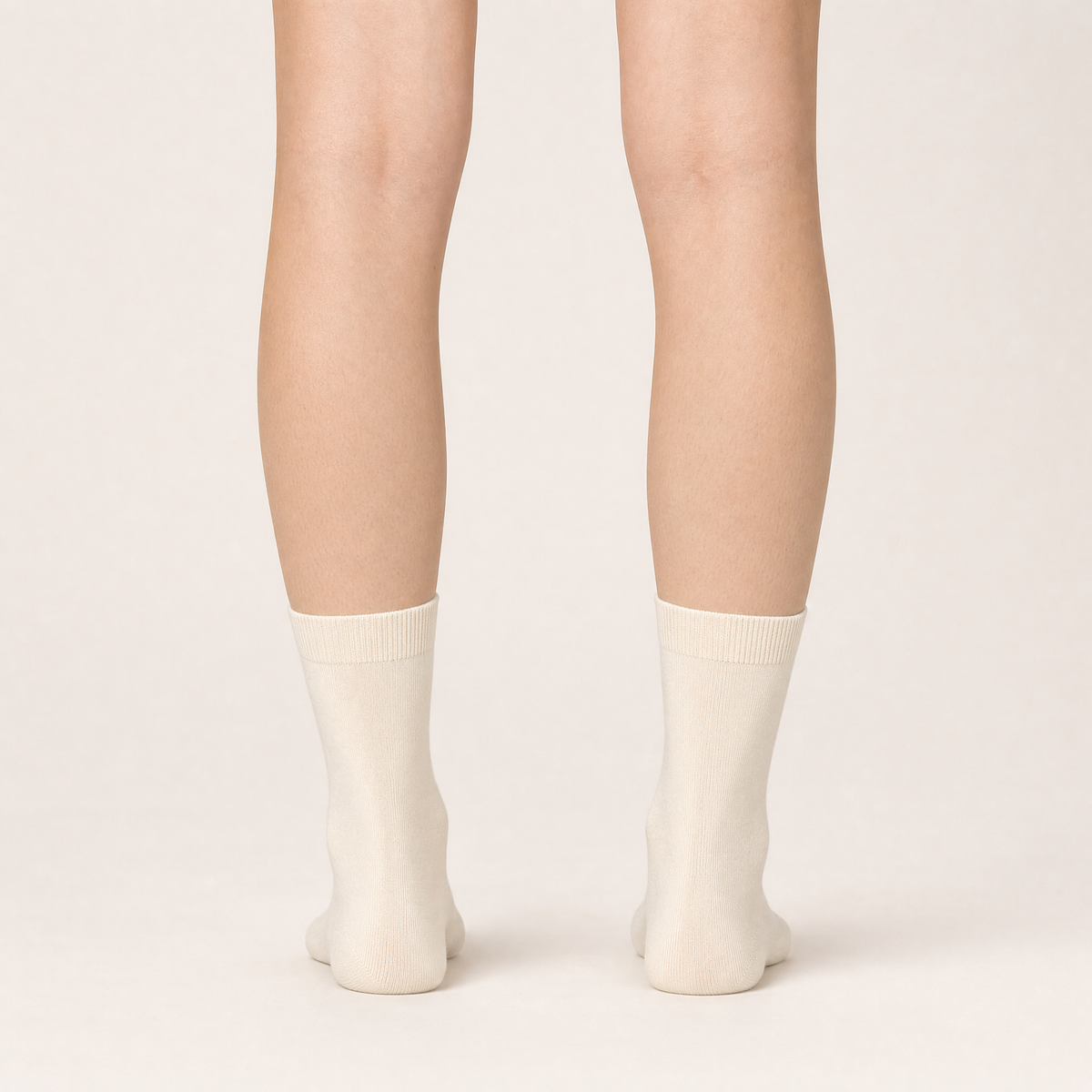 Ivory dress crew socks worn, back view