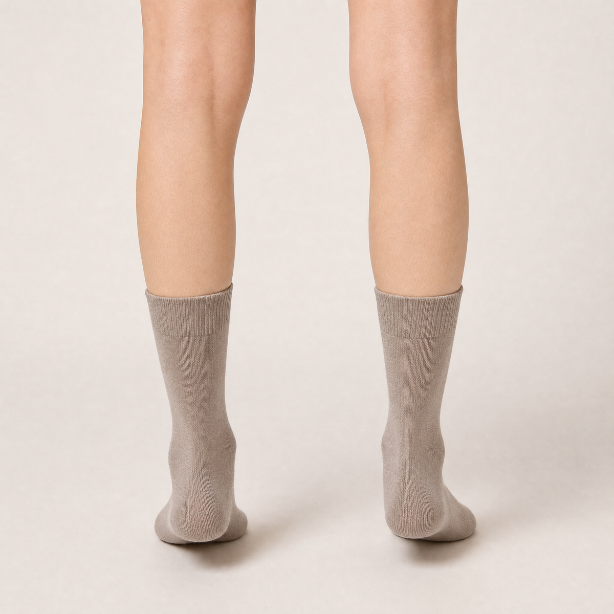 Taupe cotton crew socks worn, back view