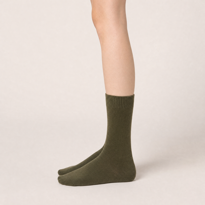 Olive merino crew socks worn, side view