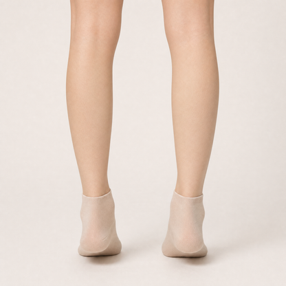 Sheer nude ankle socks worn, back view